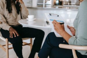 A candidate sits with a talent recruiter